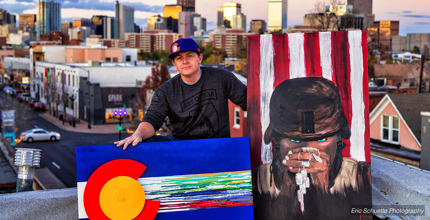 an artist showcases his work on a rooftop
