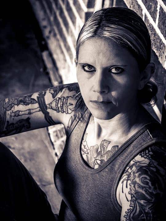 A black and white close up of a woman