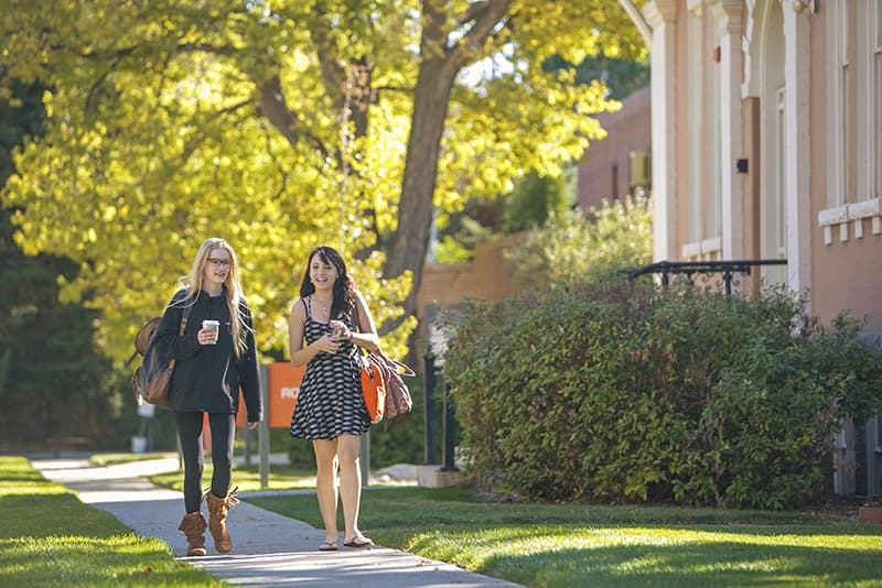 two rmcad students walking on campus