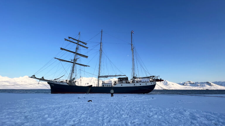 Residency ship docked in the Arctic